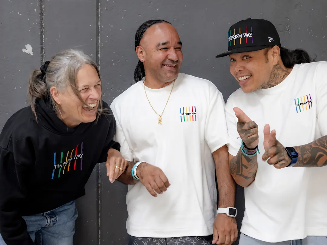 A picture of TPW founder, Kristin, and staff members, Boanergez and Kay, caught in laughter.
